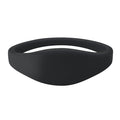 Black silicone SPIDProx U-Band proximity wristband, a thin rounded band with an embedded 125 kHz proximity chip. Sold by Specialist ID.