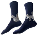 Squirrel Socks shown against a white background. These navy-blue crew socks feature two charming brown squirrels with white underbellies, prominent black eyes, and short rounded ears: one on the left enjoying a nut and the other on the right poised for action. Made from a soft cotton blend, the socks are available in sizes that fit most men and women.