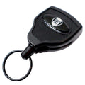 A black key fob with a textured surface and a round metal key ring attached. The front features a logo with the text "SPD" and "SPECIALIST ID." This Super Heavy Duty Retractable Keychain - 8oz or 10 Keys - Durable 48” (4 Ft) Kevlar Lanyard is designed for durability, making it perfect for everyday use.