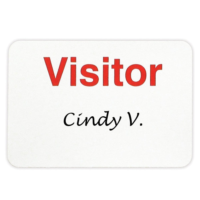 White rectangular adhesive badge with "Visitor" printed in large red letters, and "Cindy V." written below in black script, designed for effective visitor management, VISITOR Manual Non-expiring 2" X 3" Adhesive Badge, Box of 1000 (P/N 05806).