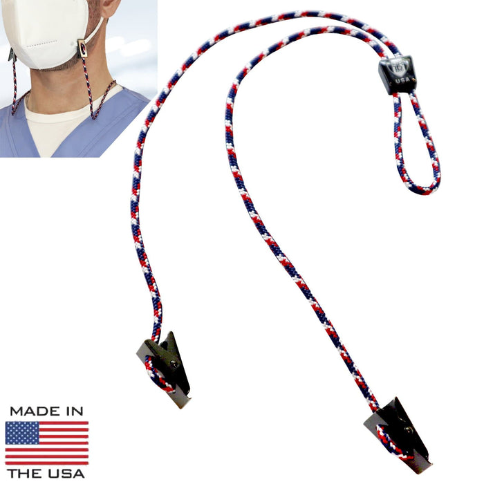 USA Made Adjustable Double Clip Lanyard - Woven Nylon Neck Hanger with 2 Bulldog Clips showcasing a red, white, and blue braided design with adjustable black clasps and an adjustable slider. A person in a mask wears the double-ended lanyard. "Made in the USA" with an American flag displayed bottom left.