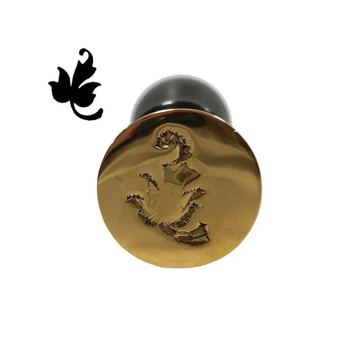 Antique‑style wax seal stamp with a leaf design, shown on a white background. It features a dark cherry‑stained wooden handle and a 1⅛‑inch round solid brass seal with a distressed finish. The stamp is about 5½ inches tall, interchangeable, designed for traditional hard sealing wax, and sold separately.