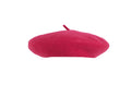 The image features a red beret made from soft, high‑quality felted wool that feels dense yet plush to the touch, with a gentle firmness that springs back when pressed. The hat has a smooth, rounded shape and a comfortable band that rests snugly around the head, allowing it to be worn tilted, pulled low for warmth, or pushed back. Overall, it offers a warm, sturdy, and luxurious feel that is both comforting and stylish.